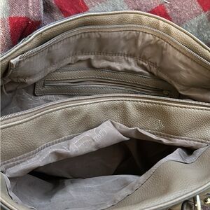 Rosetti purse. Good condition. One small mark as shown in pictures.